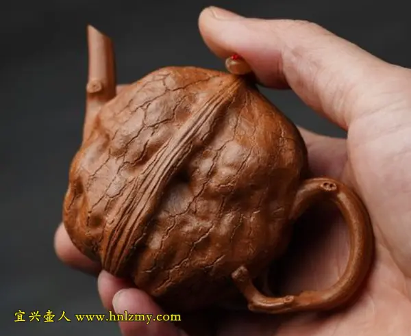 专门拿在手里盘玩的紫砂壶